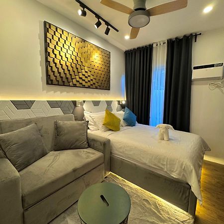 Fullerton Suites Puting Kahoy Exterior photo