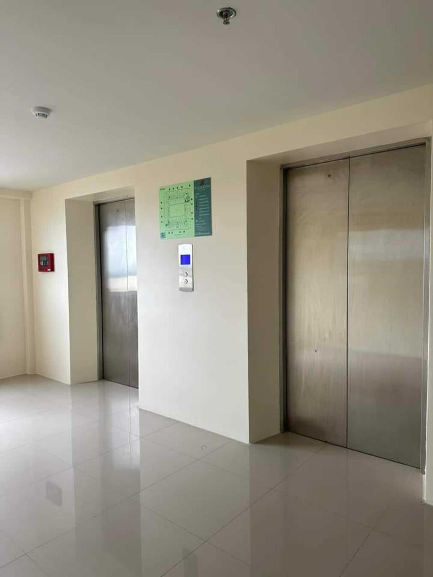 Fullerton Suites Puting Kahoy Exterior photo