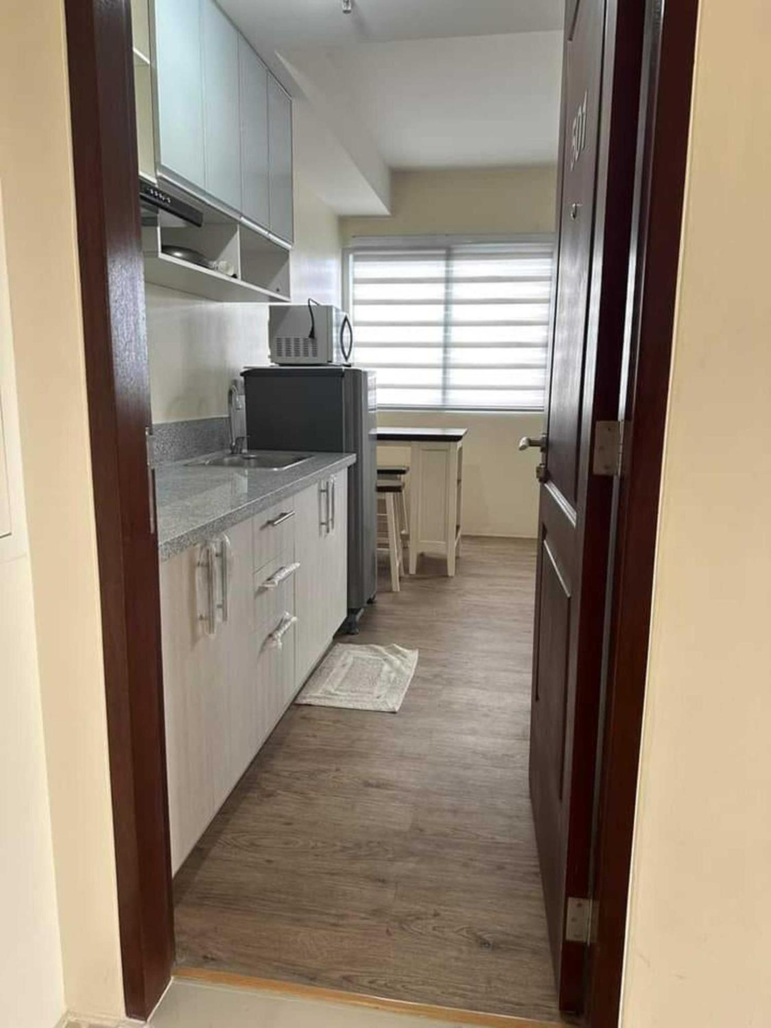 Fullerton Suites Puting Kahoy Exterior photo