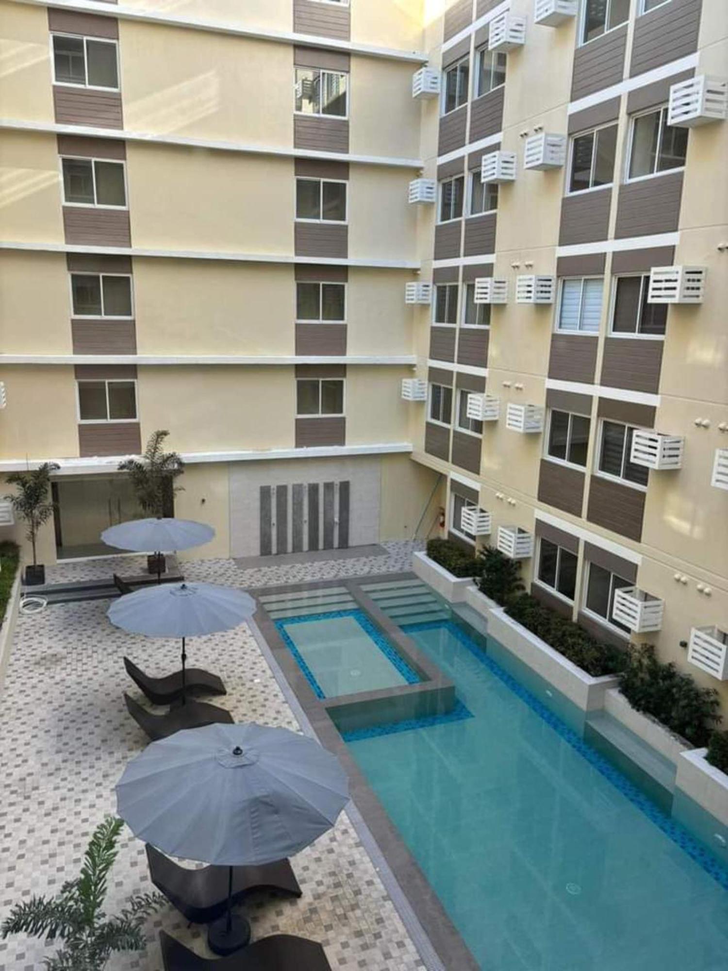 Fullerton Suites Puting Kahoy Exterior photo
